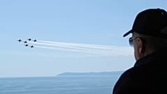 Turkish President Recep Tayyip Erdogan watches jet fighters fly past during the final day of military exercises near Izmir on 9 June 2022