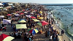Palestinians swim in Mediterranean sea