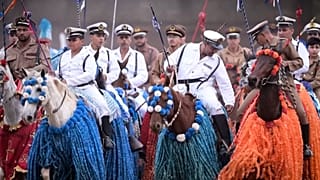 Men riding horses take part in traditional festival Cavalhada in Brazil