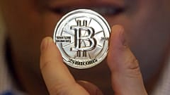 Imagen de un token con un valor de 25 bitcóins.