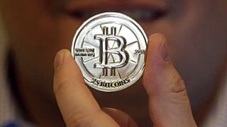 Imagen de un token con un valor de 25 bitcóins.