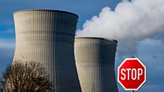 Steam rises from the cooling tower of the nuclear power plant of Gundremmingen, Bavaria, Dec. 31, 2021.
