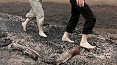 It is not yet clear why the victims were walking on hot coals.