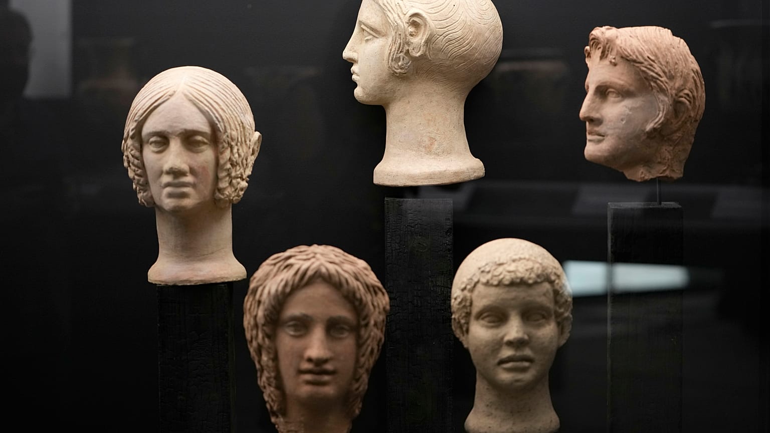 Votive terracotta heads and half-heads from the 3rd and 4th centuries B.C. are displayed in the new Museum of Rescued Art in Rome