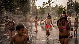 Children cooling off in Madrid, Spain