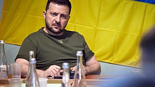 Ukrainian President Volodymyr Zelenskyy attends a meeting with military officials as he visits the war-hit Mykolaiv region.