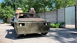 Ukraine mechanics turn rally cars into 'combat buggies'