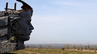 A picture shows a damaged statue at the World War II Savur Mohyla memorial in Snizhne, some 80km east of Donetsk, on October 15, 2014. 