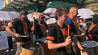 Marcha de ONG de ayuda a los refugiados en el Día del Refugiado 2022 en Lyon, Francia