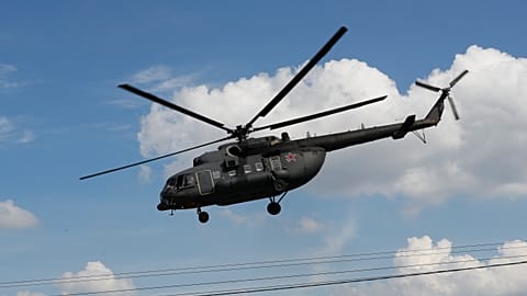 A Russian military Mi-8 helicopter pictured in the skies above in Moscow.