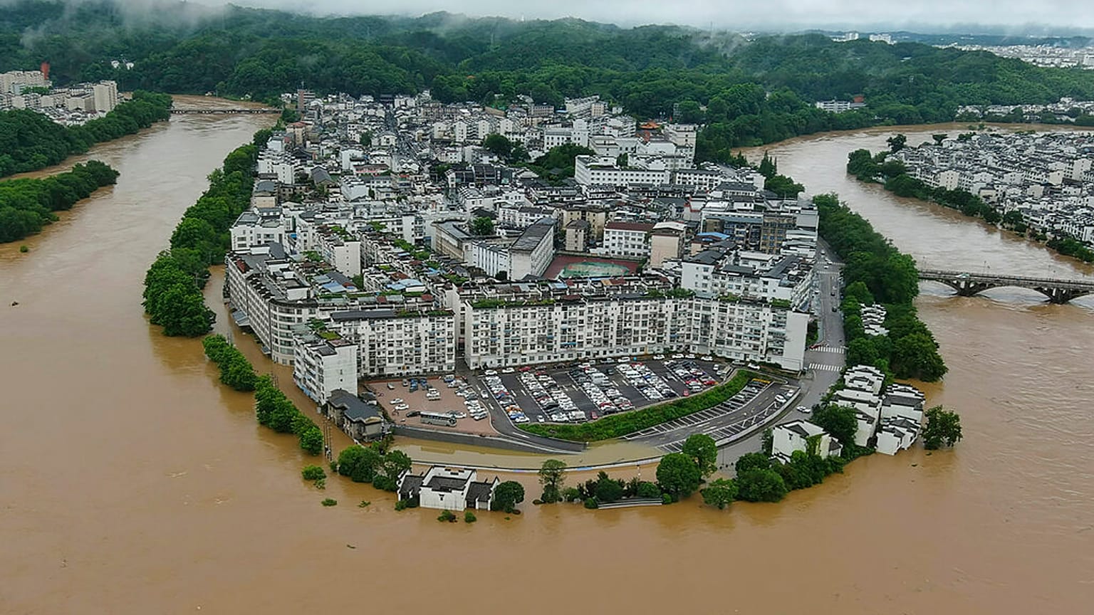 Aerial photo shows flooded areas of Wuyuan County, southeastern China's Jiangxi Province, June 20, 2022. 