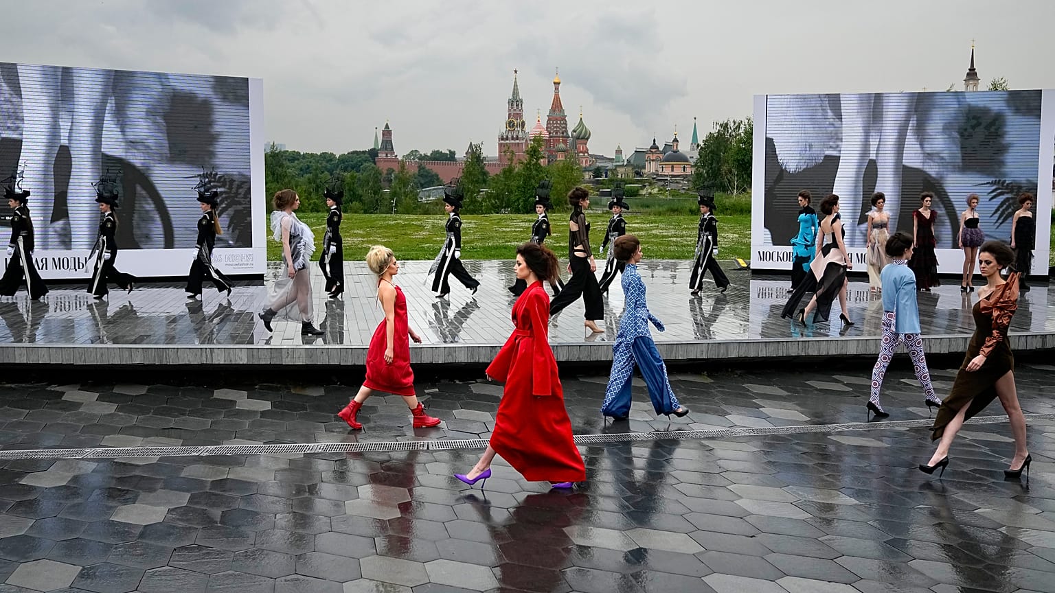 Models display a collection during the Fashion Week at Zaryadye Park near Red Square in Moscow