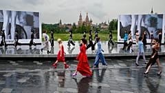 Models display a collection during the Fashion Week at Zaryadye Park near Red Square in Moscow