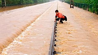Les rails d'un train sous l'eau dans la province de Guangxi 21/06/2022