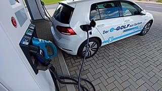 A parking placed is reserved for electrical cars in front of a charging station during a press tour of the plant of the German manufacturer Volkswagen AG