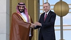 Mohammed bin Salman and Recep Tayyip Erdogan shake hands during a welcome ceremony in Ankara.