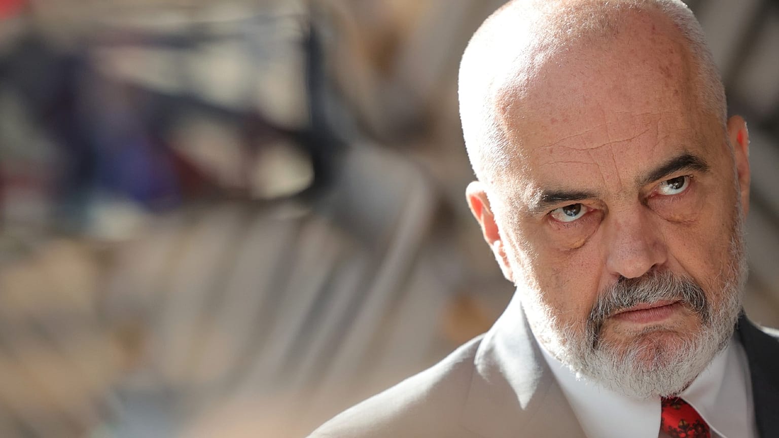 Albanian Prime Minister Edi Rama speaks with the media as he arrives for an EU summit in Brussels, Thursday, June 23, 2022