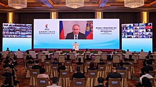 Le président russe Vladimir Poutine prend la parole à distance lors de la cérémonie d'ouverture du 14ème sommet des BRICS, à Pékin, Chine, le 22 juin 2022.