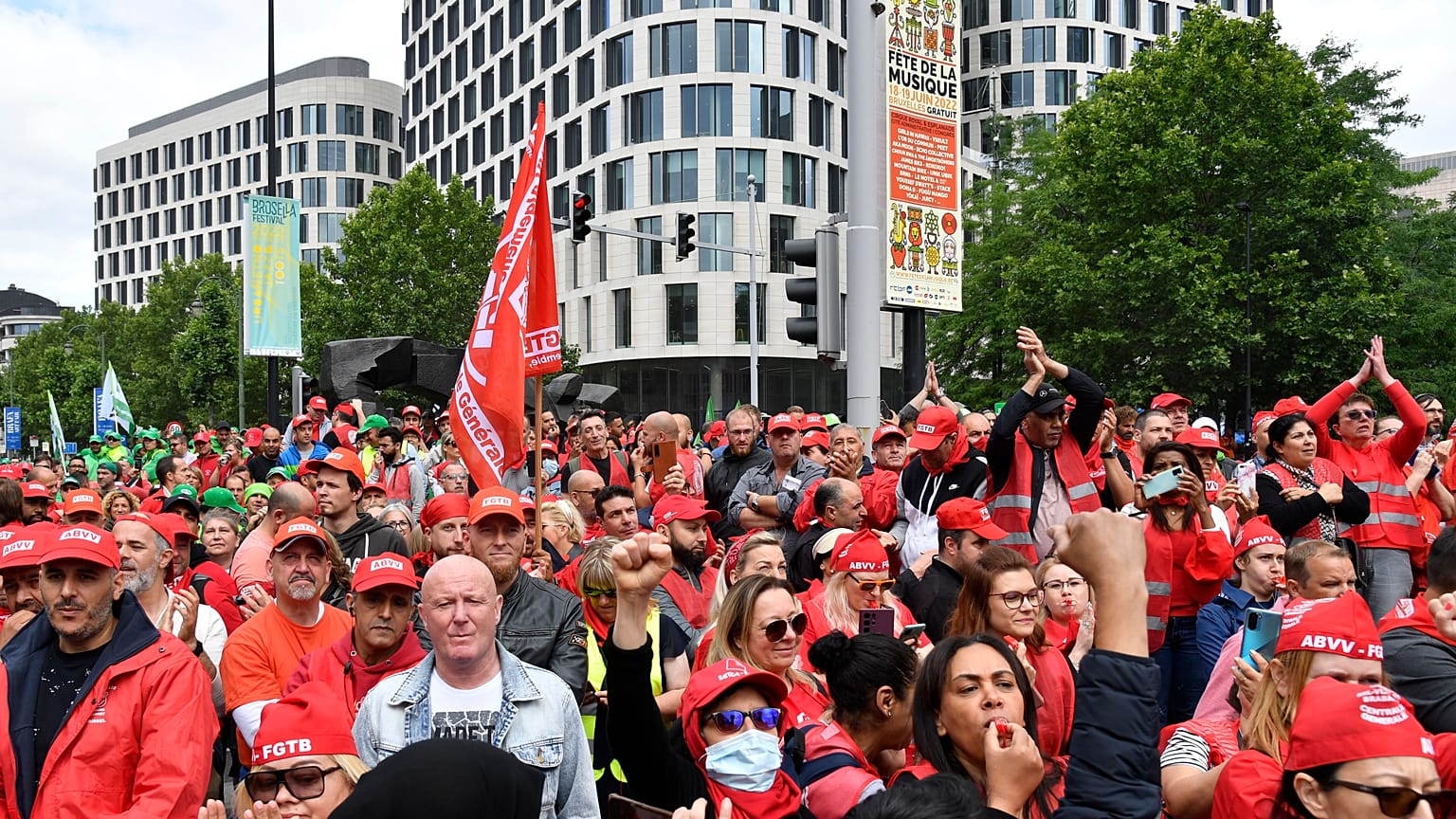 Members of various trade unions march during a demonstration in Brussels on June 20.