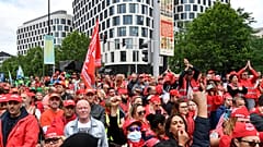 Members of various trade unions march during a demonstration in Brussels on June 20.