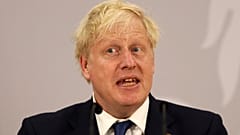 Boris Johnson addresses a press conference during the Commonwealth Heads of Government Meeting (CHOGM) at Lemigo Hotel in Kigali on June 24, 2022.