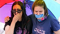 Abortion-rights activists in the US react after hearing the Supreme Court decision on abortion outside the Supreme Court in Washington, Friday, June 24, 2022.