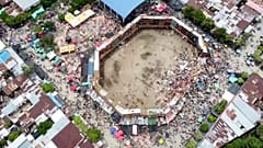 An image taken from video shows the scene after part of a wooden stand collapsed at a bullfight, Sunday, June 26, 2022, at El Espinal in Tolima state, central Colombia.