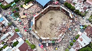 An image taken from video shows the scene after part of a wooden stand collapsed at a bullfight, Sunday, June 26, 2022, at El Espinal in Tolima state, central Colombia.