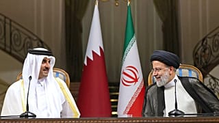 İran Cumhurbaşkanı İbrahim Reisi (sağda) Katar Emiri Şeyh Tamim bin Hamad el-Tani (sağda)