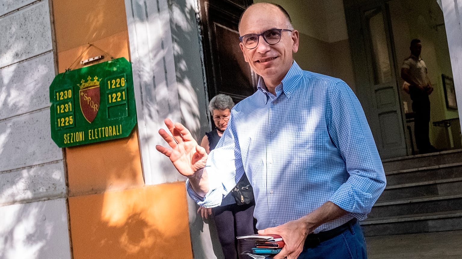Former Italian prime minister Enrico Letta leaves a polling station in Rome.