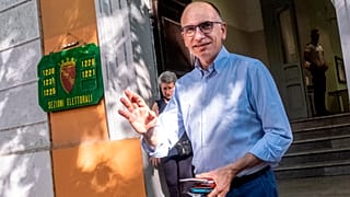Former Italian prime minister Enrico Letta leaves a polling station in Rome.