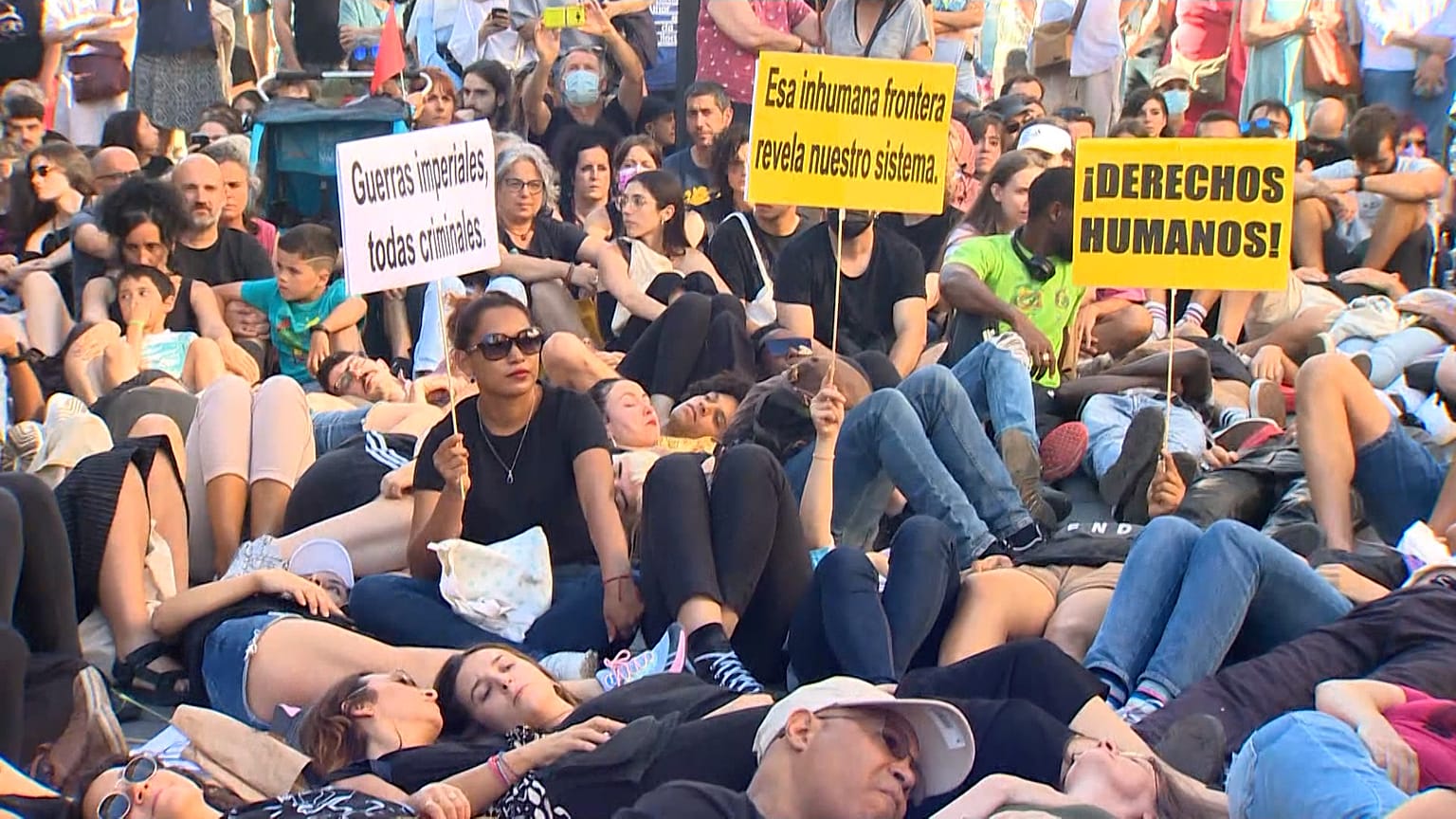 Protests against response at the border as migrants tried to storm the barrier