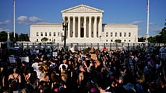 Protesters fill the street in front of the Supreme Court after the court's decision to overturn Roe v. Wade