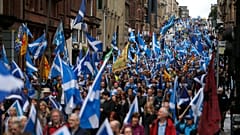 Thousands of people take part in the 'All Under One Banner' march for Scottish independence through Glasgow city centre, Scotland, Saturday, July 30, 2016.