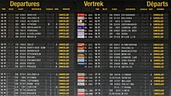  departures board with cancelled flights in the departures hall at Brussels international airport during a general strike in Brussels, Monday, June 20, 2022. 