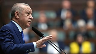 Turkish President Recep Tayyip Erdogan addresses his ruling party legislators, in Ankara, Turkey, Wednesday, May 18, 2022