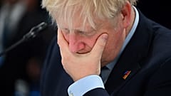 Johnson gestures ahead of a meeting of The North Atlantic Council during the NATO summit at the Ifema congress centre in Madrid, on June 30, 2022.