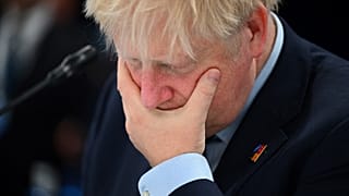Johnson gestures ahead of a meeting of The North Atlantic Council during the NATO summit at the Ifema congress centre in Madrid, on June 30, 2022.