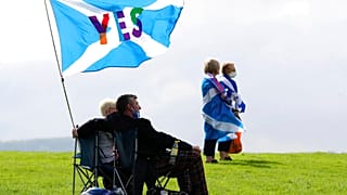 People take part in the All Under One Banner Scottish independence demonstration near Stirling, Scotland, Wednesday, Aug. 19, 2020. 