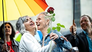 Annett Babinsky, right, and Laura Suarez celebrate their marriage at the registry office 'Amtshaus' in Zurich, Switzerland, July 1, 2022.