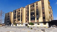 Libya's charred parliament building is seen in Tobruk, Libya, Saturday, July 2, 2022