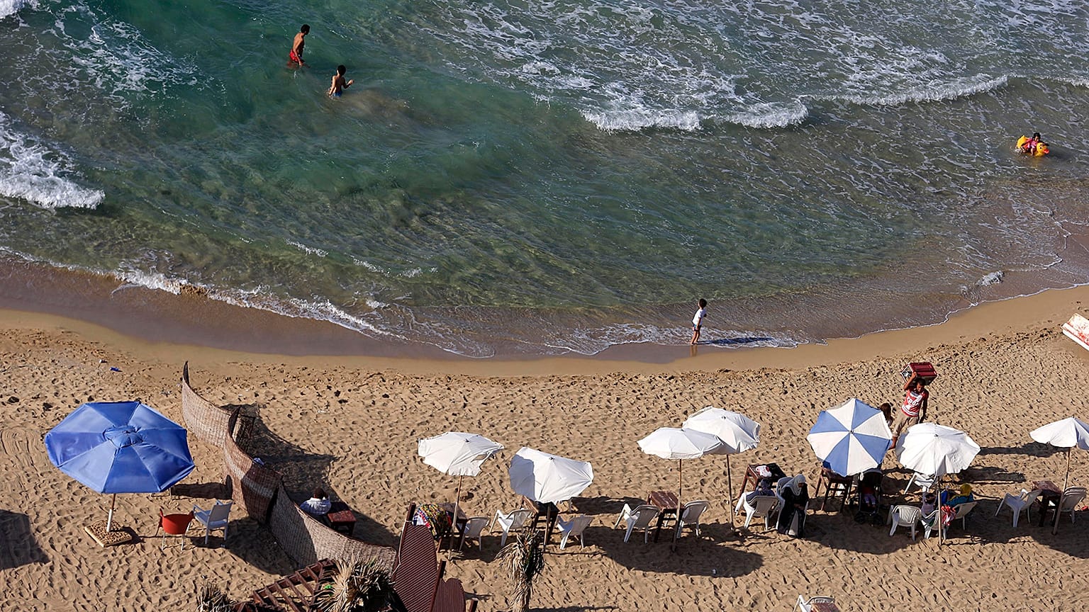 People enjoy the beach in Egypt in 2015