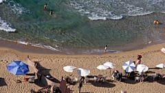 People enjoy the beach in Egypt in 2015