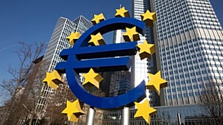A sculpture depicting the Euro currency symbol by German artist Ottmar Hörl is seen in front of the former European Central Bank (ECB) on December 22, 2021.
