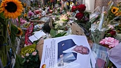 Tributes are placed at the spot where journalist Peter R. de Vries was shot in Amsterdam.