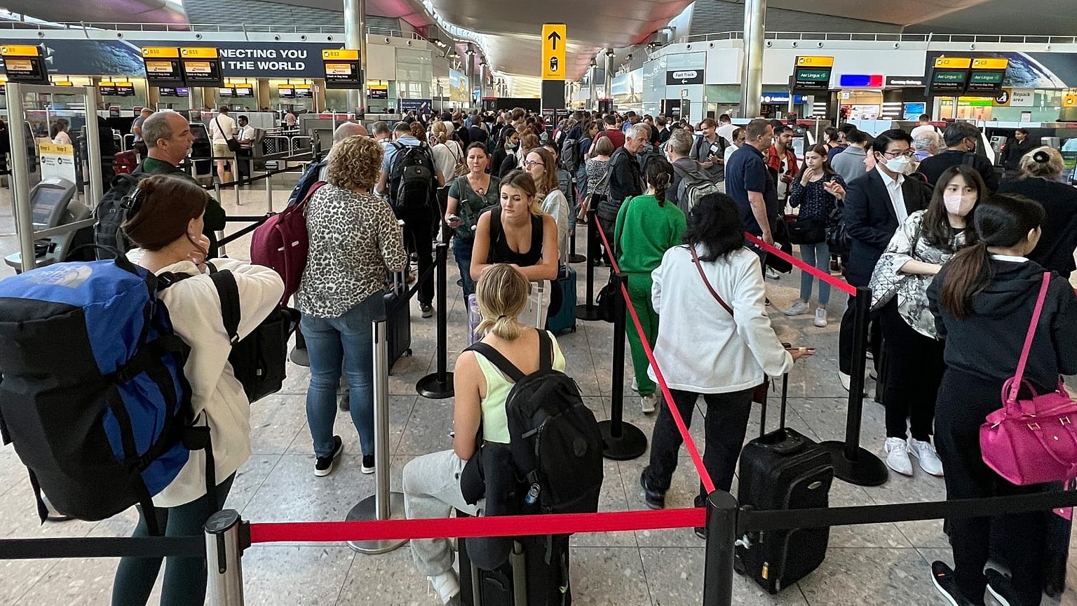 Travellers face long queues at London's Heathrow airport