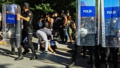 Some protesters were forced to the ground by police in Ankara.