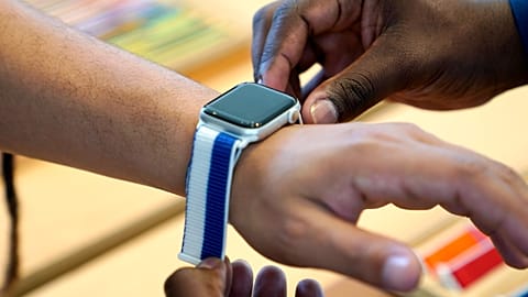 An Apple Watch featuring the country of Greece is tried on at an Apple store in Aventura, Florida, USA, July 15, 2021,