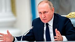 Vladimir Putin gestures as he speaks to members of the State Duma and the Federal Assembly of The Russian Federation in the Kremlin in Moscow, Russia, Thursday, July 7, 2022.