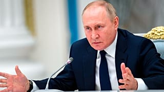 Vladimir Putin gestures as he speaks to members of the State Duma and the Federal Assembly of The Russian Federation in the Kremlin in Moscow, Russia, Thursday, July 7, 2022.